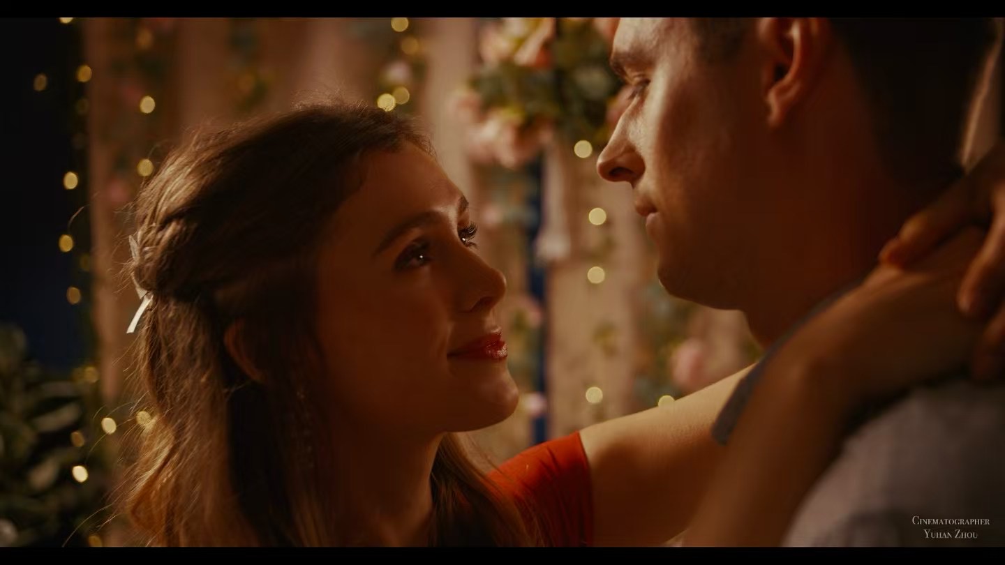 Couple dancing under fairy lights