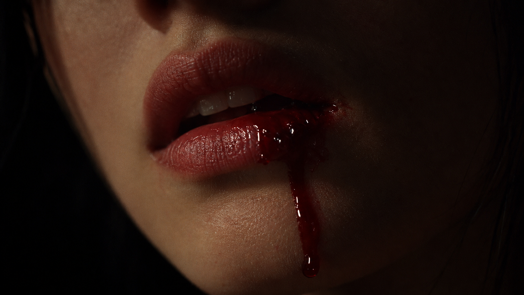 Close-up of lips with blood