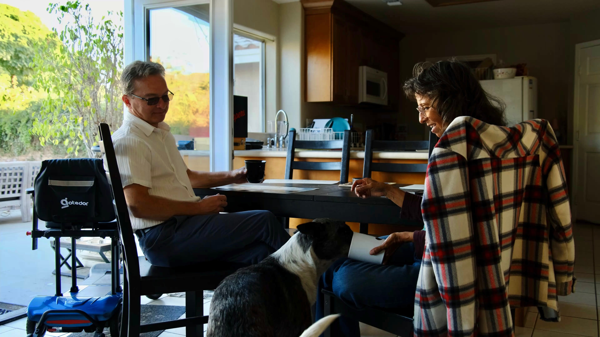 Mobility scooter in a home kitchen scene