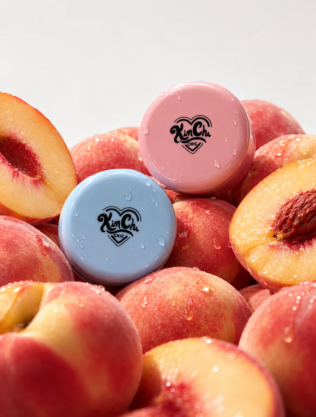 KimChi Chic lip balm tins among fresh peaches